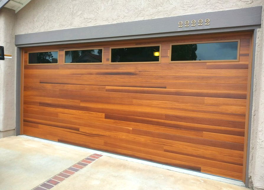 Custom garage door installation in Florida featuring a unique pattern and color, highlighting the craftsmanship of local garage door services in FL