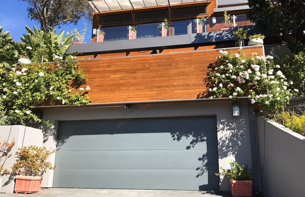 Professional technician providing expert garage door repair services in Florida, ensuring safety and functionality for residential properties.