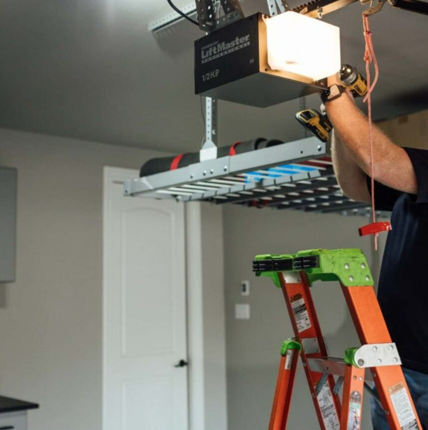 a technician performing garage door opener repair in Florida. Highlighting Local Garage Door Services FL expertise in fixing and maintaining garage door openers for residential properties. Perfectly capturing the precision and care taken during repair procedures.